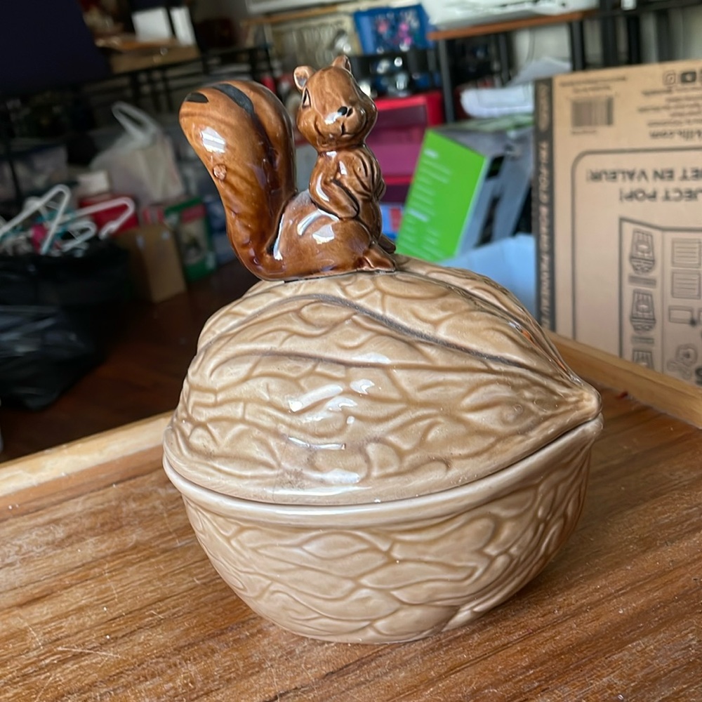 Squirrel candy dish on walnut with lid.